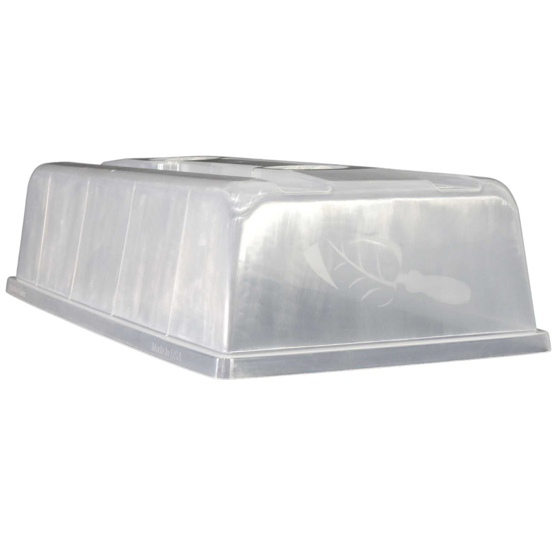 Clear plastic humidity dome on a white background