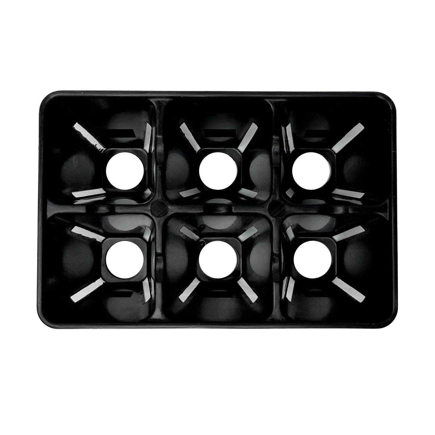 Black plastic seed tray with multiple compartments on a white background 